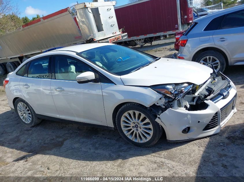 2012 Ford Focus Titanium VIN: 1FAHP3J2XCL358909 Lot: 39240574