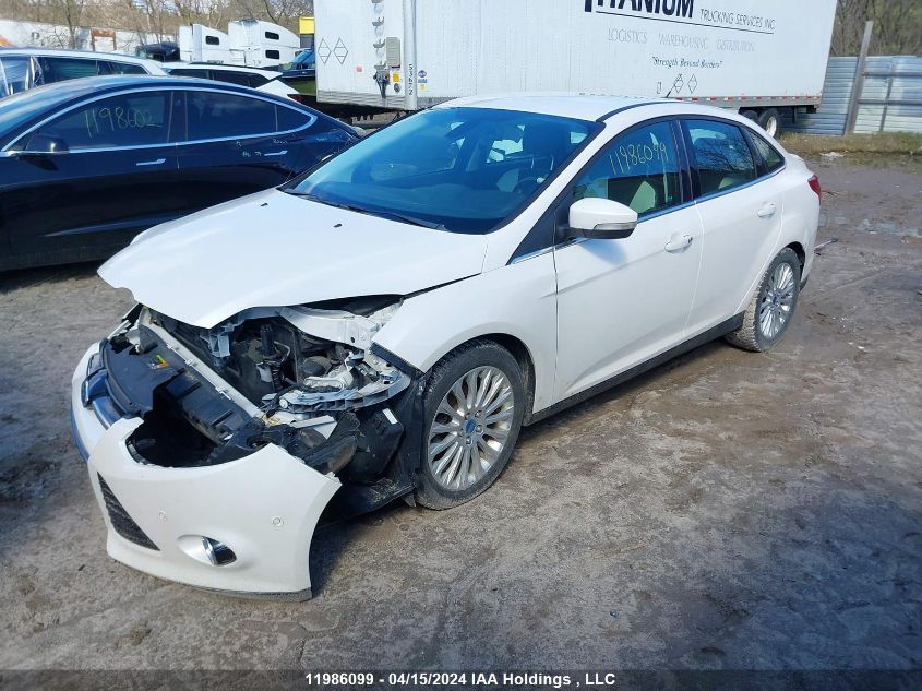 2012 Ford Focus Titanium VIN: 1FAHP3J2XCL358909 Lot: 39240574