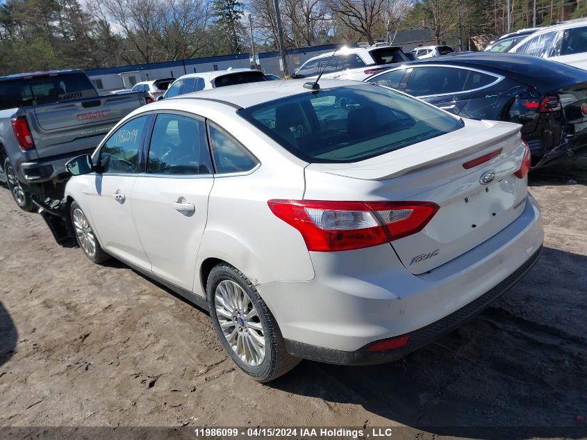 2012 Ford Focus Titanium VIN: 1FAHP3J2XCL358909 Lot: 39240574