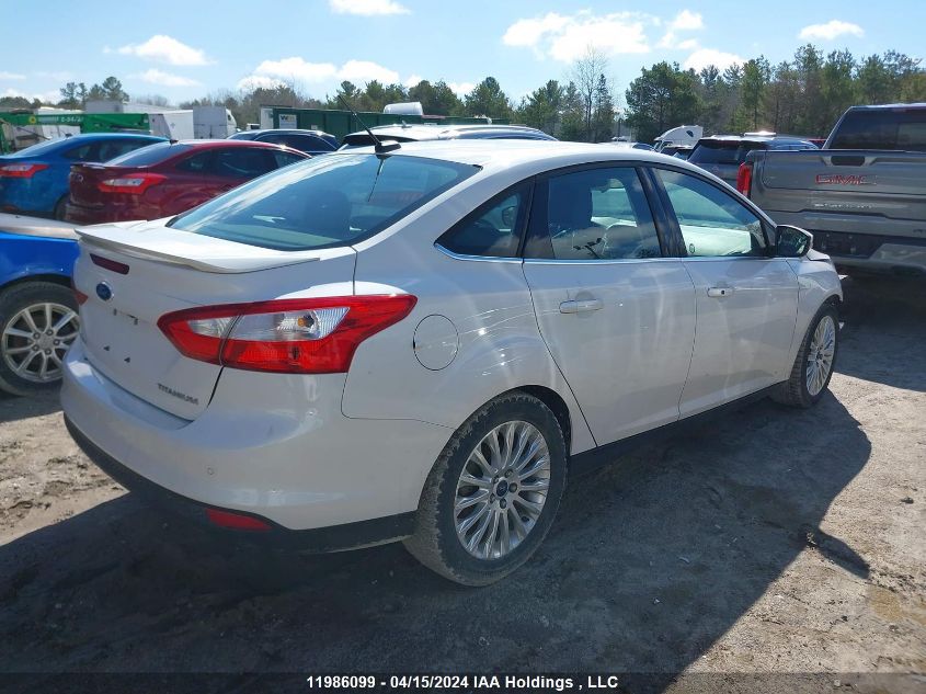 2012 Ford Focus Titanium VIN: 1FAHP3J2XCL358909 Lot: 39240574