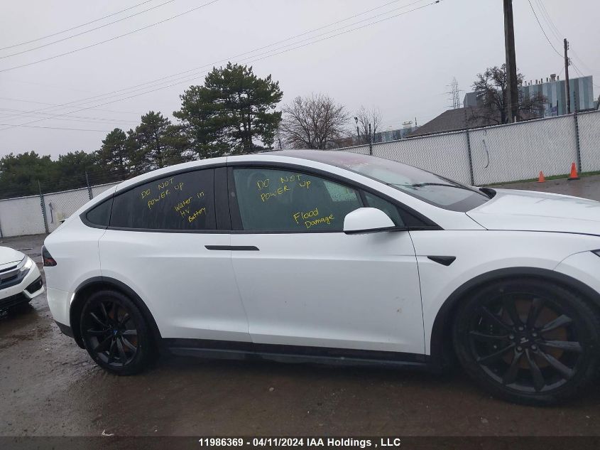 2023 Tesla Model X VIN: 7SAXCBE52PF399417 Lot: 11986369