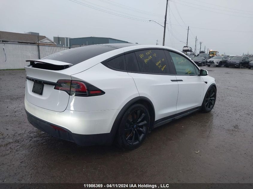 2023 Tesla Model X VIN: 7SAXCBE52PF399417 Lot: 11986369