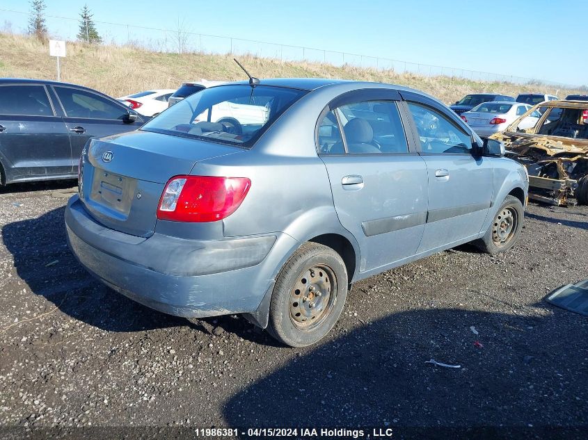 2009 Kia Rio VIN: KNADE223596488861 Lot: 11986381