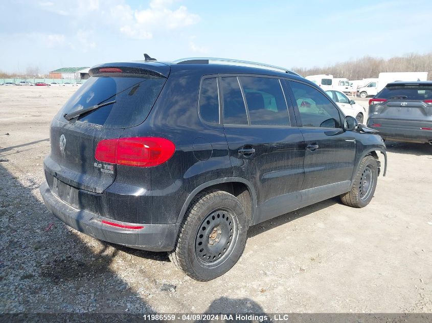 2014 Volkswagen Tiguan VIN: WVGJV3AX8EW551697 Lot: 11986559