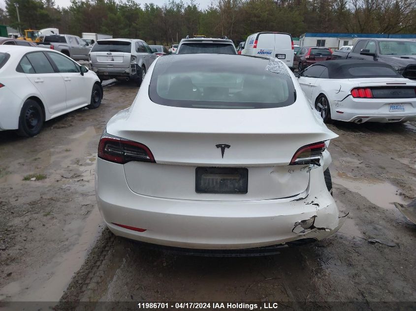 2021 Tesla Model 3 VIN: 5YJ3E1EA1MF057983 Lot: 11986701