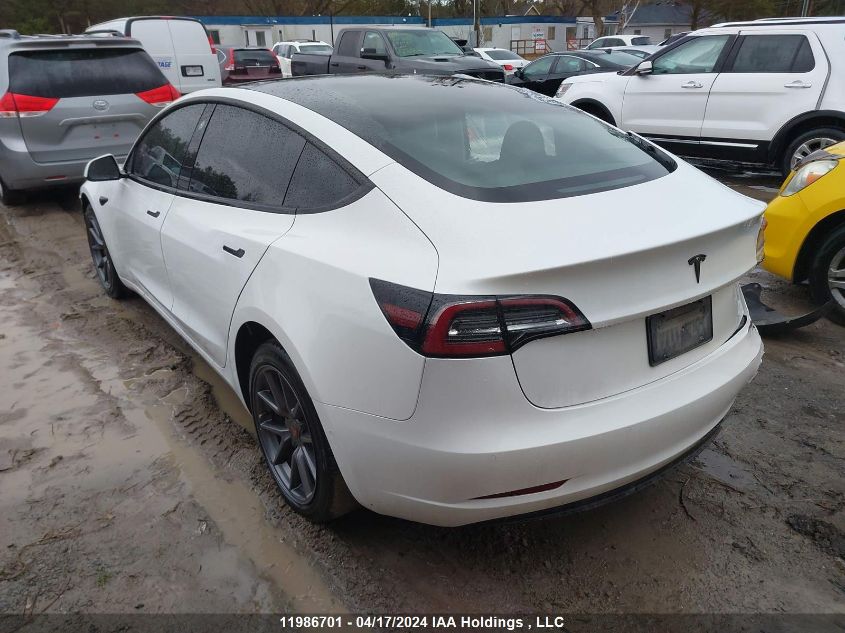 2021 Tesla Model 3 VIN: 5YJ3E1EA1MF057983 Lot: 11986701