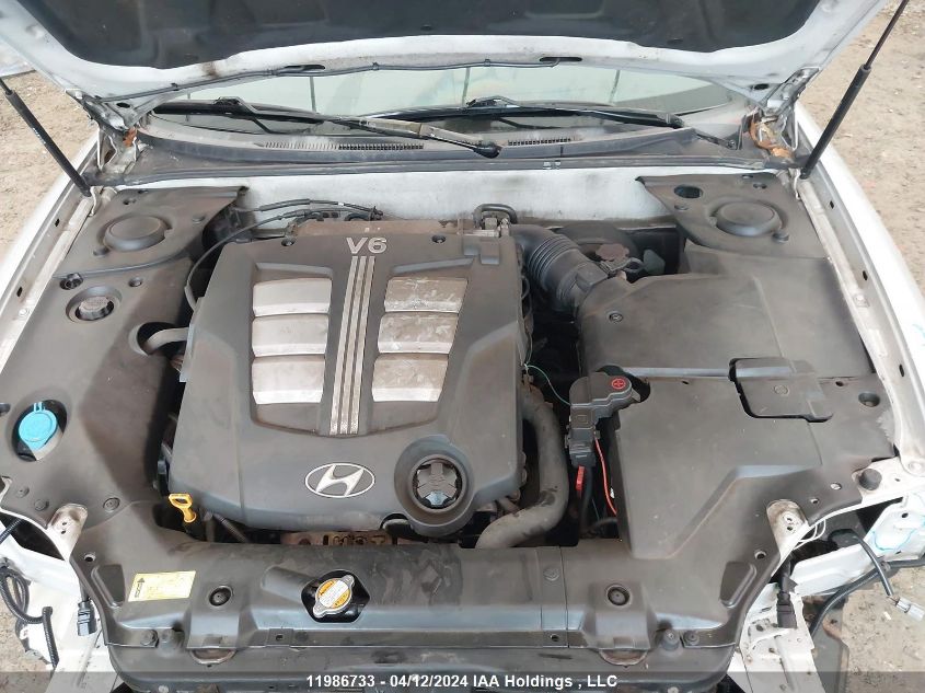 2006 Hyundai Tiburon VIN: KMHHN65F86U197646 Lot: 11986733