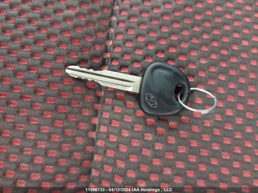 2006 Hyundai Tiburon VIN: KMHHN65F86U197646 Lot: 11986733