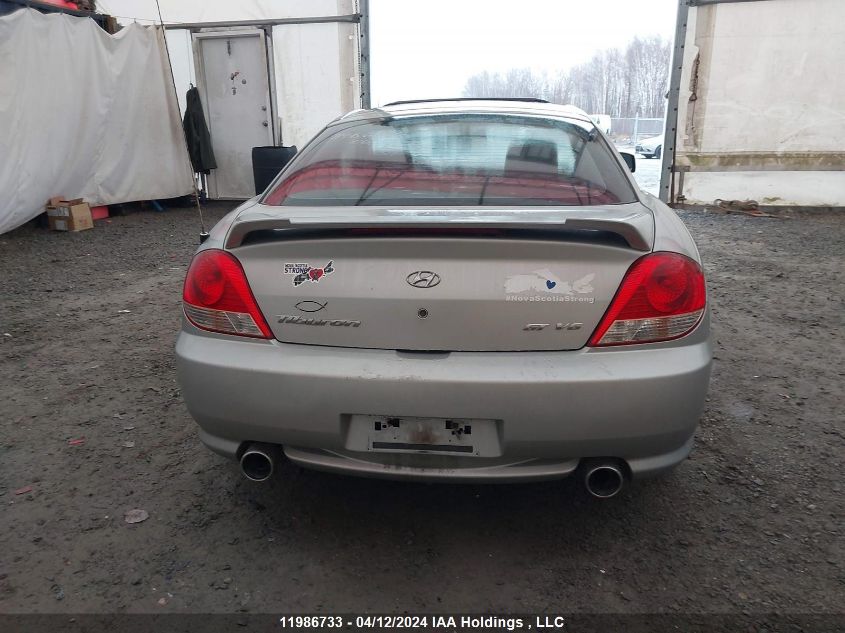 2006 Hyundai Tiburon VIN: KMHHN65F86U197646 Lot: 11986733