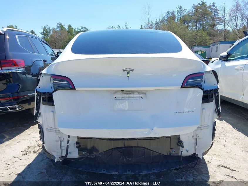 2022 Tesla Model Y VIN: 7SAYGDEE0NF565239 Lot: 11986740