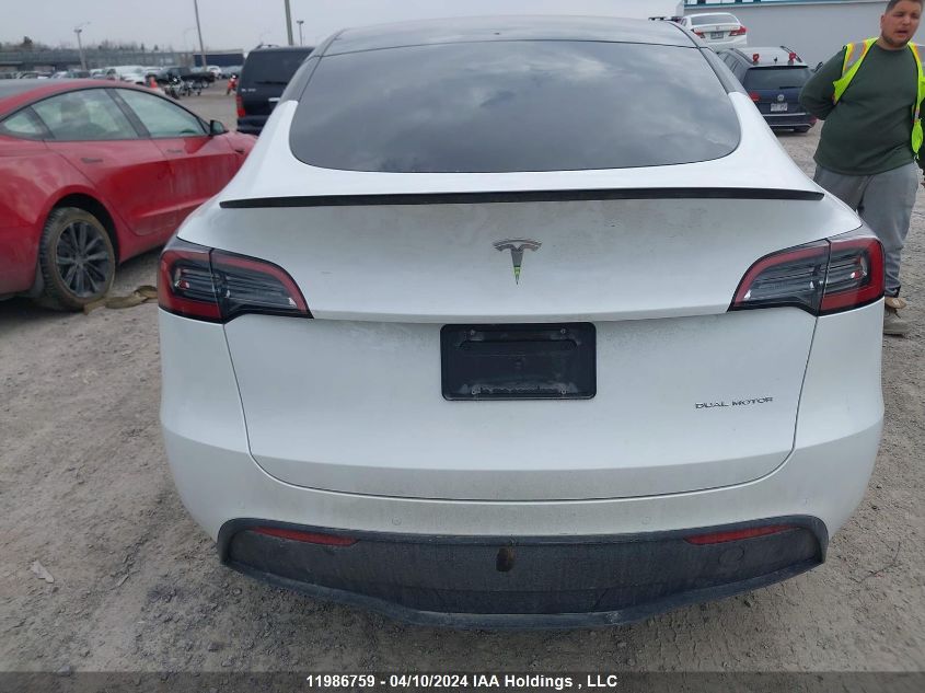 2022 Tesla Model Y VIN: 7SAYGDEE4NF563574 Lot: 11986759