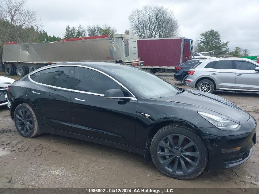 2019 Tesla Model 3 VIN: 5YJ3E1EA9KF329399 Lot: 11986802