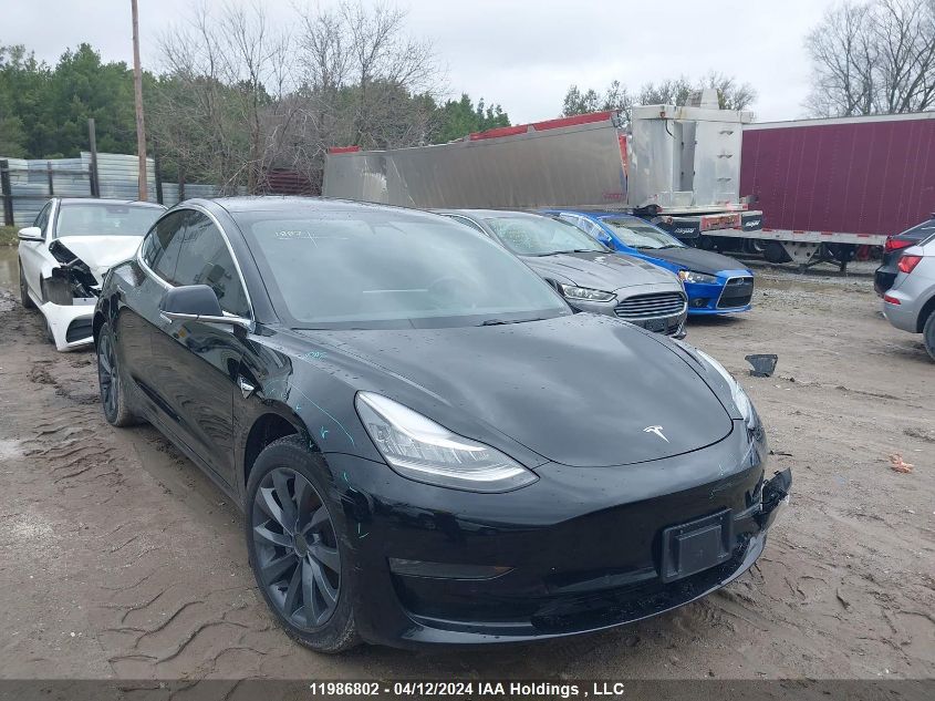 2019 Tesla Model 3 VIN: 5YJ3E1EA9KF329399 Lot: 11986802