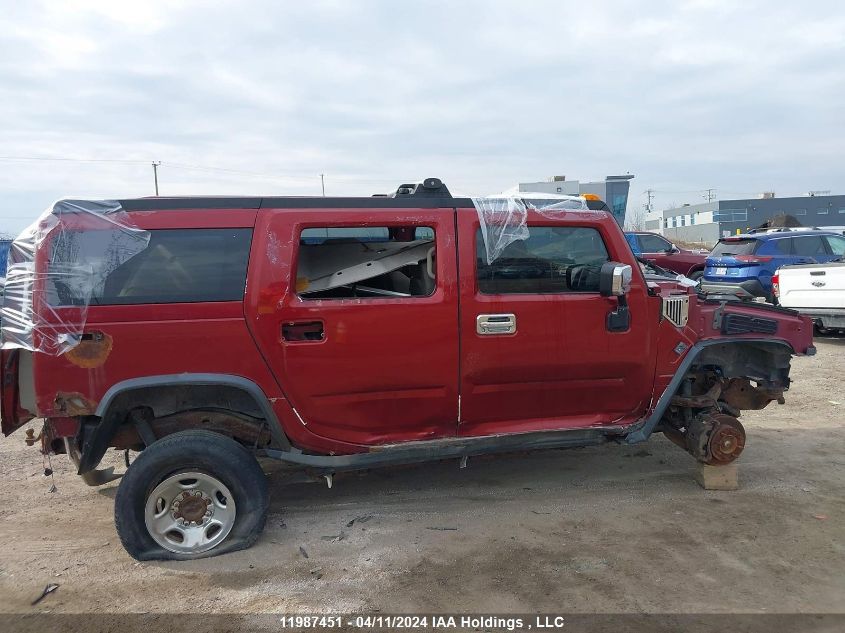 2003 Hummer H2 VIN: 5GRGN23U83H100104 Lot: 11987451