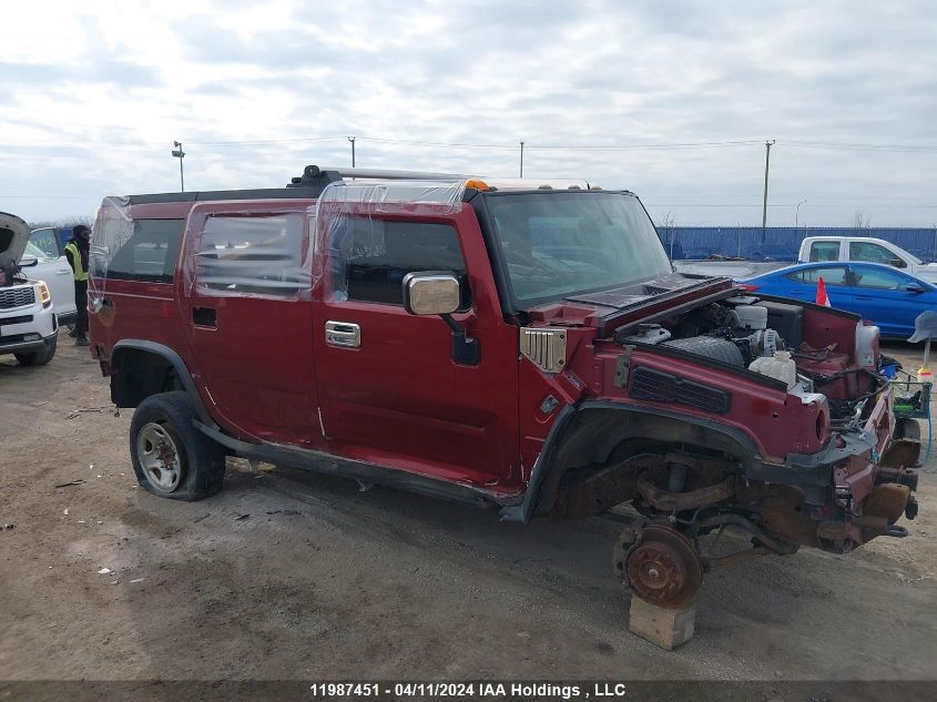 2003 Hummer H2 VIN: 5GRGN23U83H100104 Lot: 11987451