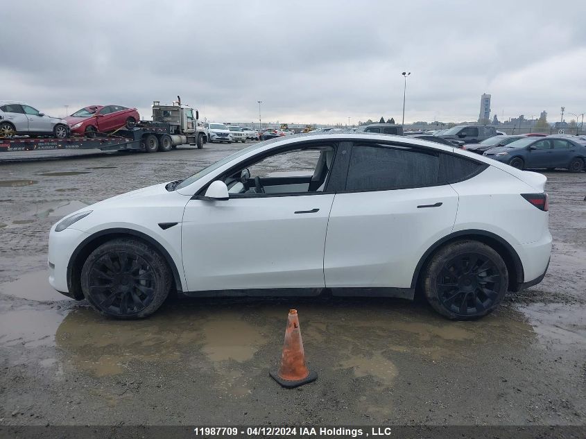 2022 Tesla Model Y VIN: 7SAYGDEE6NF403129 Lot: 11987709