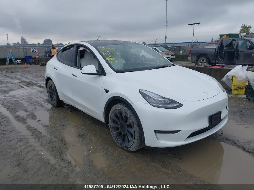 2022 Tesla Model Y VIN: 7SAYGDEE6NF403129 Lot: 11987709