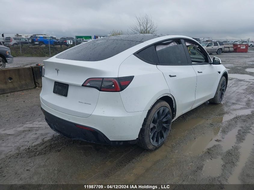 2022 Tesla Model Y VIN: 7SAYGDEE6NF403129 Lot: 11987709