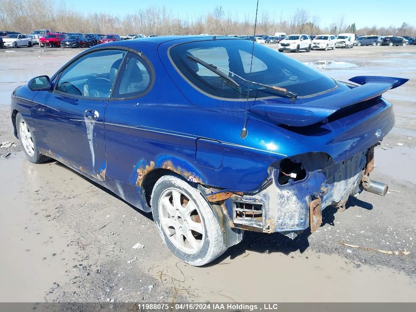 2001 Hyundai Tiburon VIN: KMHJG35F71U221020 Lot: 11988075