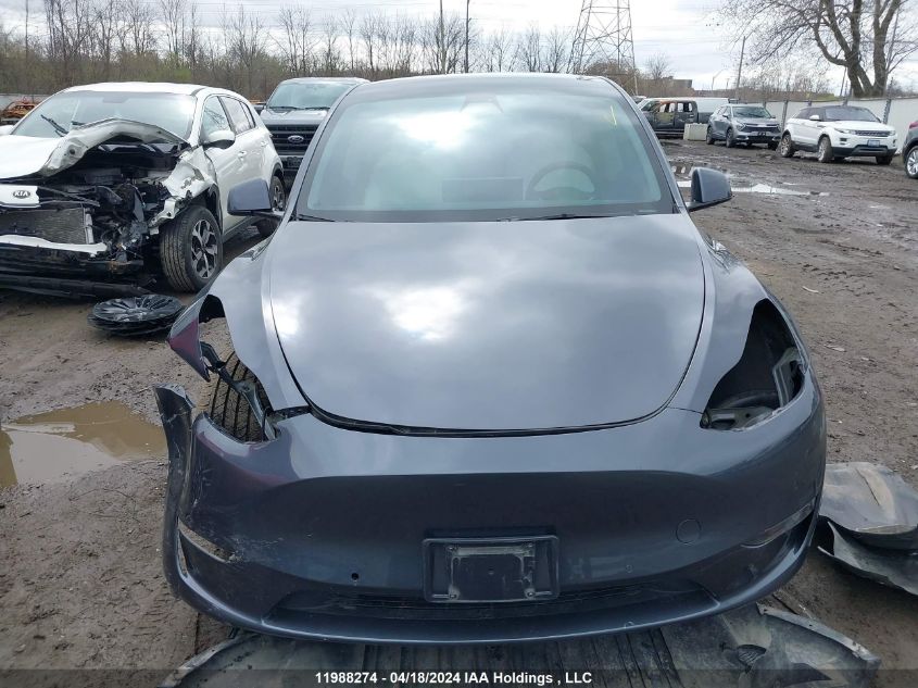 2022 Tesla Model Y VIN: 7SAYGAEE4NF431719 Lot: 11988274