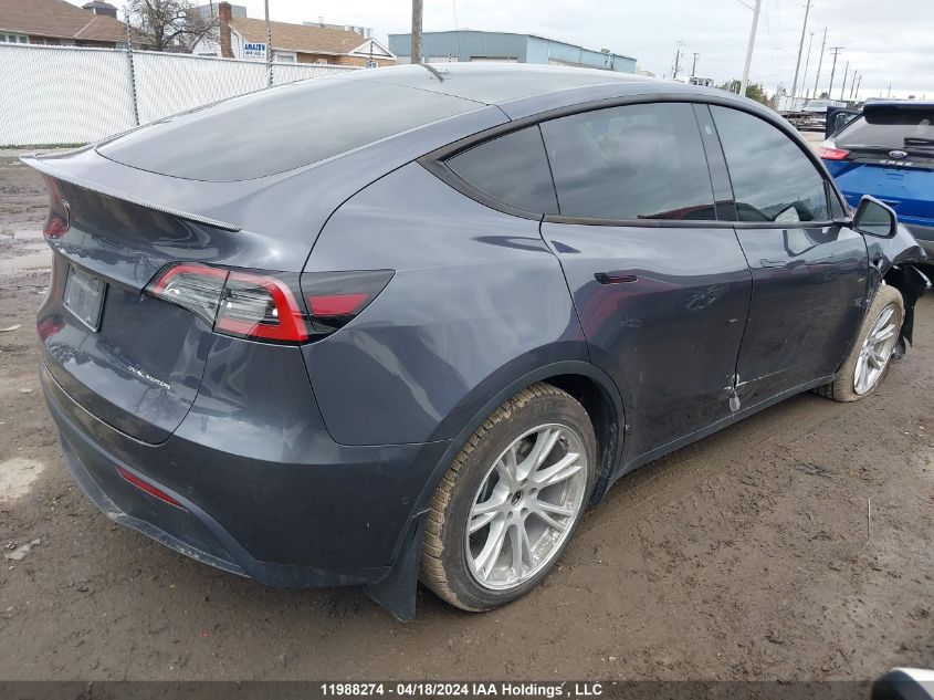 2022 Tesla Model Y VIN: 7SAYGAEE4NF431719 Lot: 11988274