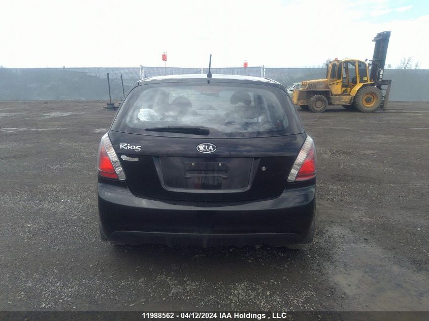 2010 Kia Rio Lx/Sx VIN: KNADH5B38A6701167 Lot: 11988562