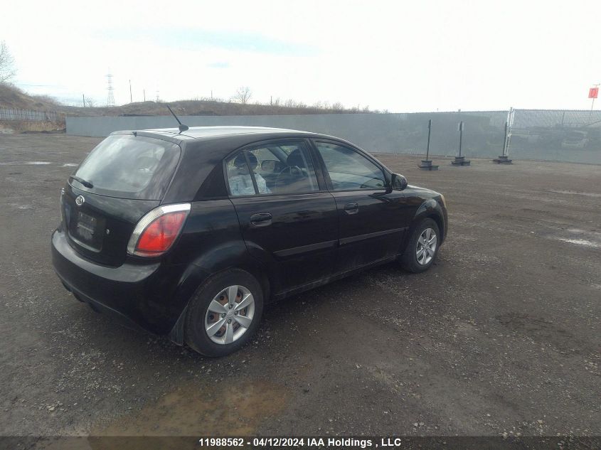 2010 Kia Rio Lx/Sx VIN: KNADH5B38A6701167 Lot: 11988562