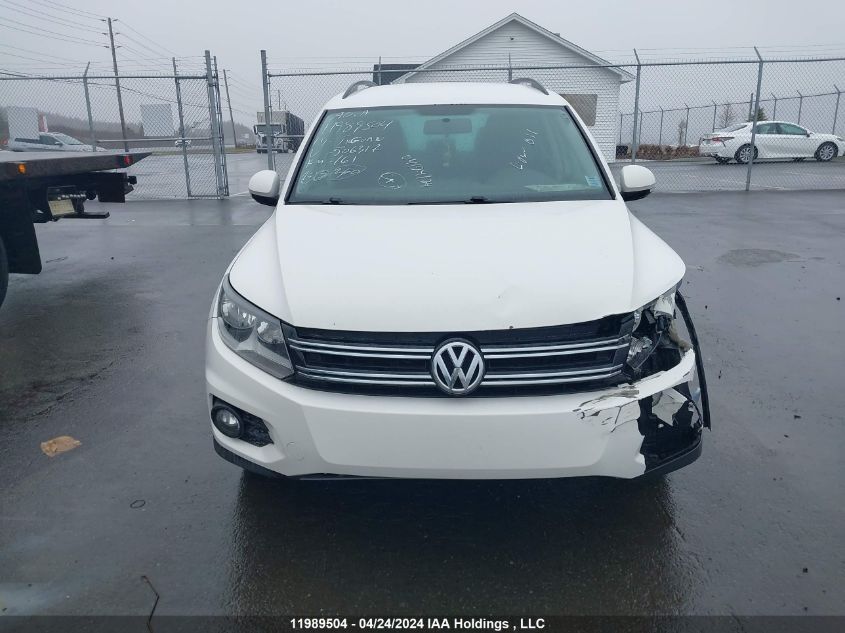 2014 Volkswagen Tiguan VIN: WVGJV3AX0EW506317 Lot: 11989504