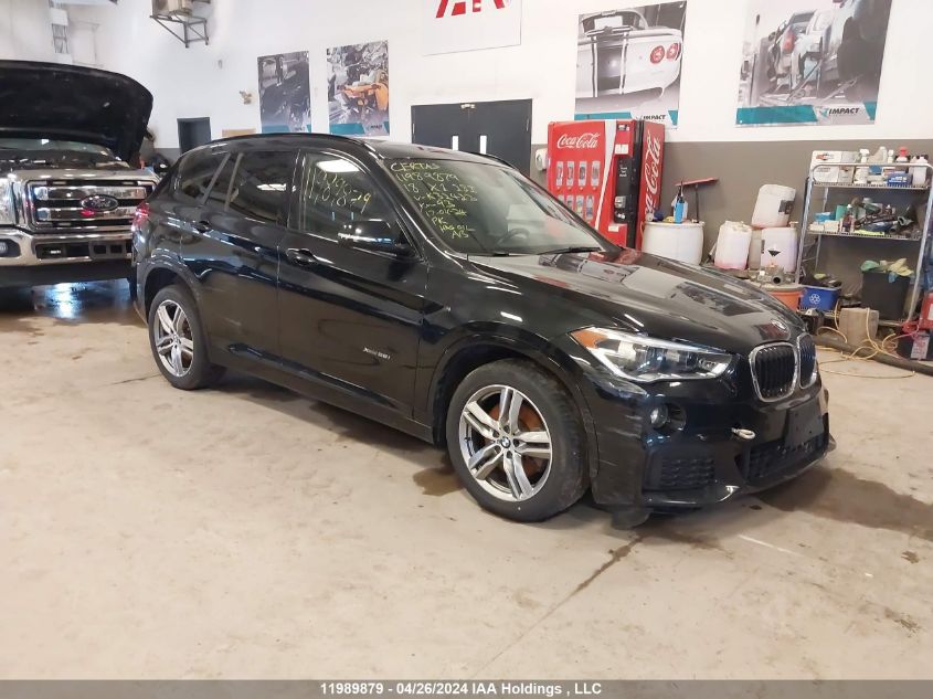 2018 BMW X1 VIN: WBXHT3C31J5K32423 Lot: 11989879