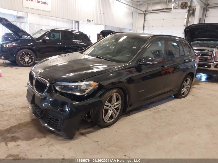 2018 BMW X1 VIN: WBXHT3C31J5K32423 Lot: 11989879