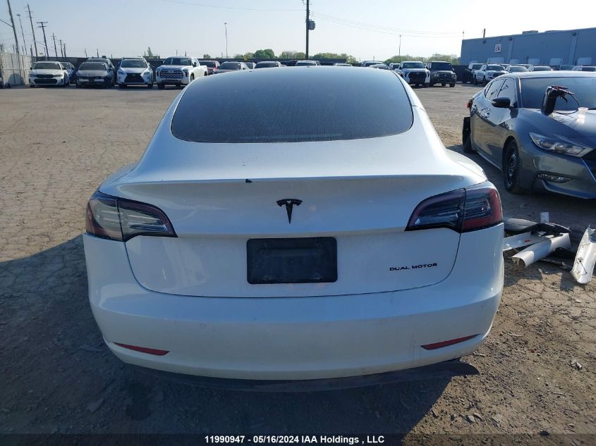 2022 Tesla Model 3 VIN: 5YJ3E1EB2NF128702 Lot: 11990947