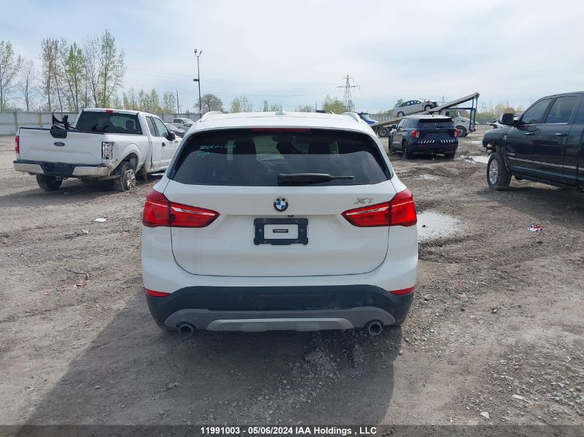 2017 BMW X1 VIN: WBXHT3C31H5F68490 Lot: 11991003