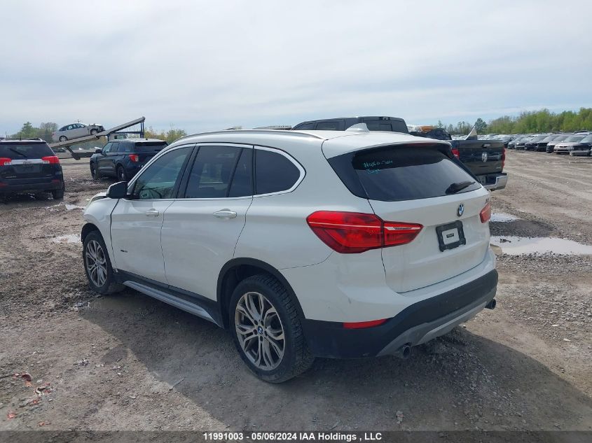 2017 BMW X1 VIN: WBXHT3C31H5F68490 Lot: 11991003