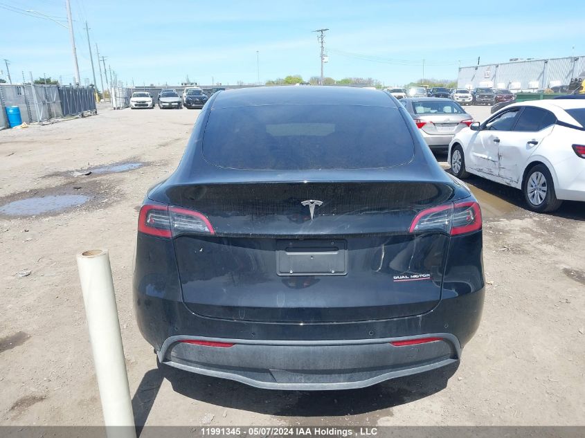 2022 Tesla Model Y VIN: 7SAYGDEF2NF521851 Lot: 11991345