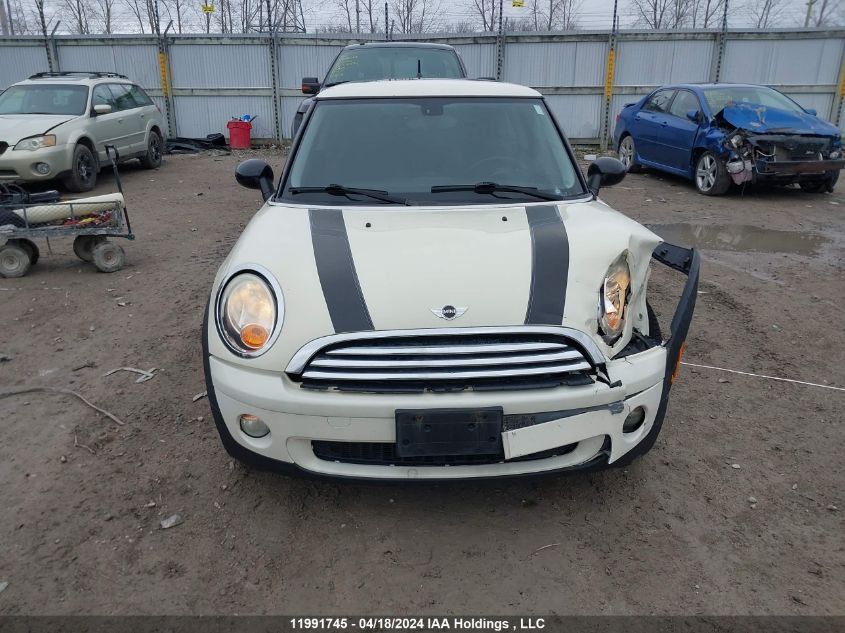 2009 Mini Cooper Hardtop VIN: WMWMF33549TW77814 Lot: 11991745