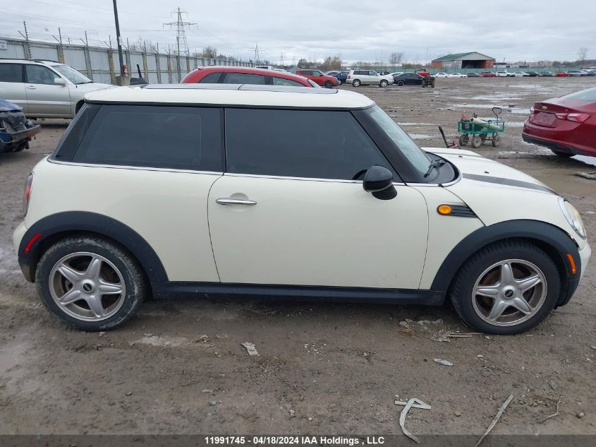 2009 Mini Cooper Hardtop VIN: WMWMF33549TW77814 Lot: 11991745