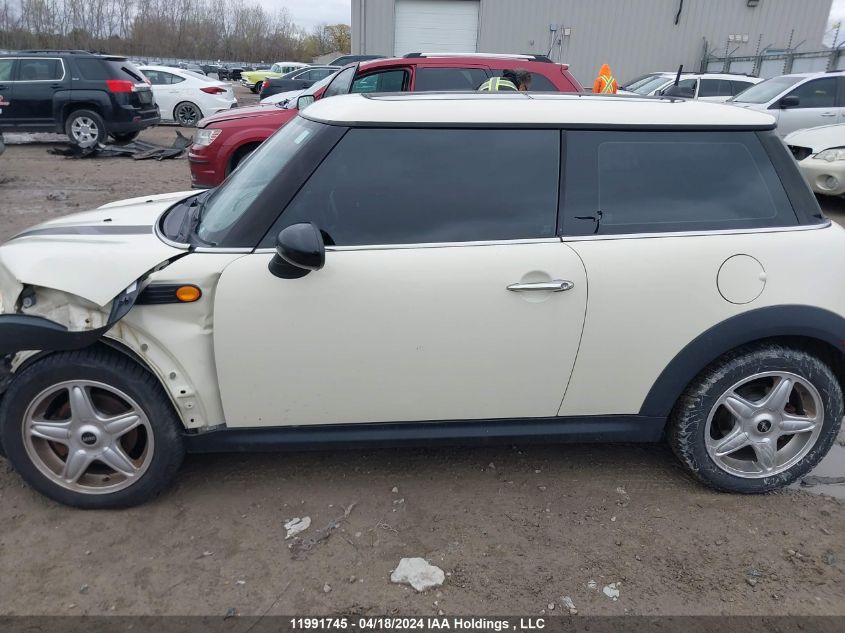 2009 Mini Cooper Hardtop VIN: WMWMF33549TW77814 Lot: 11991745