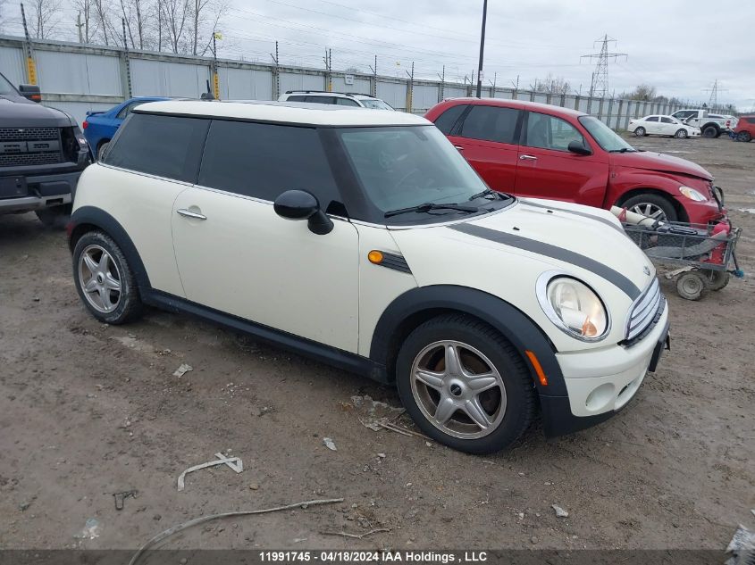 2009 Mini Cooper Hardtop VIN: WMWMF33549TW77814 Lot: 11991745