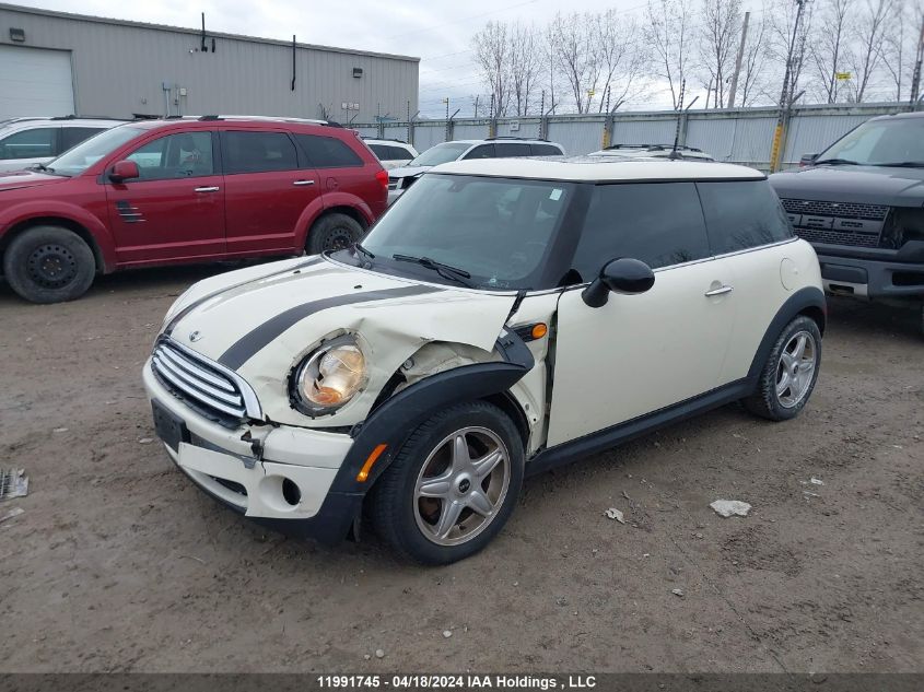 2009 Mini Cooper Hardtop VIN: WMWMF33549TW77814 Lot: 11991745