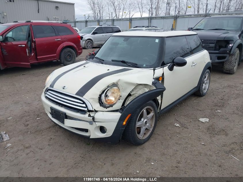 2009 Mini Cooper Hardtop VIN: WMWMF33549TW77814 Lot: 11991745