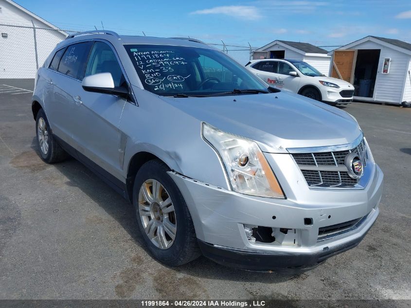 2012 Cadillac Srx VIN: 3GYFNDE33CS599697 Lot: 11991864