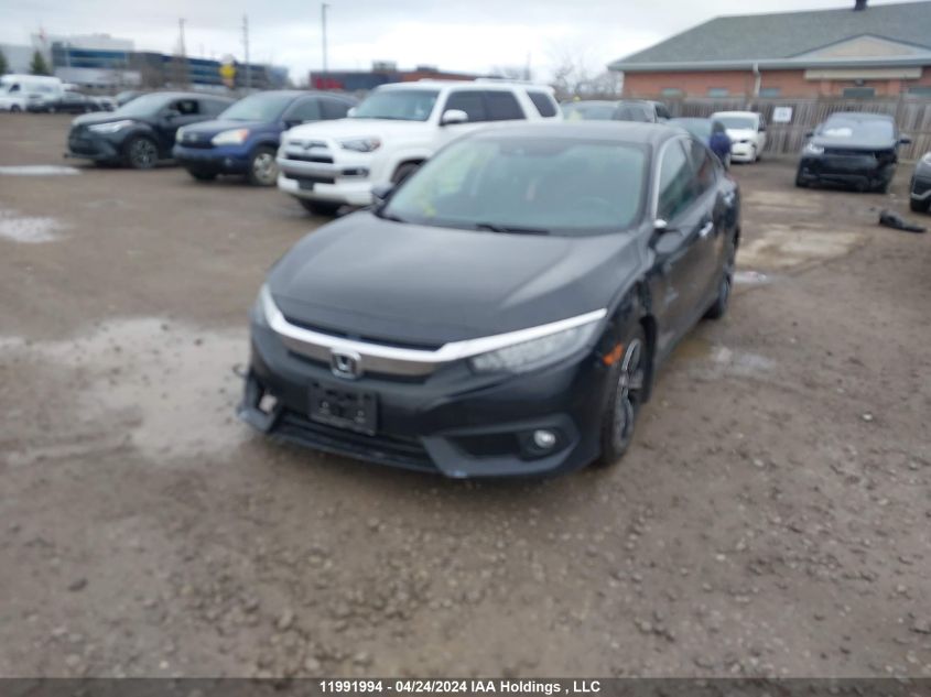 2018 Honda Civic Touring VIN: 2HGFC1F98JH106384 Lot: 11991994