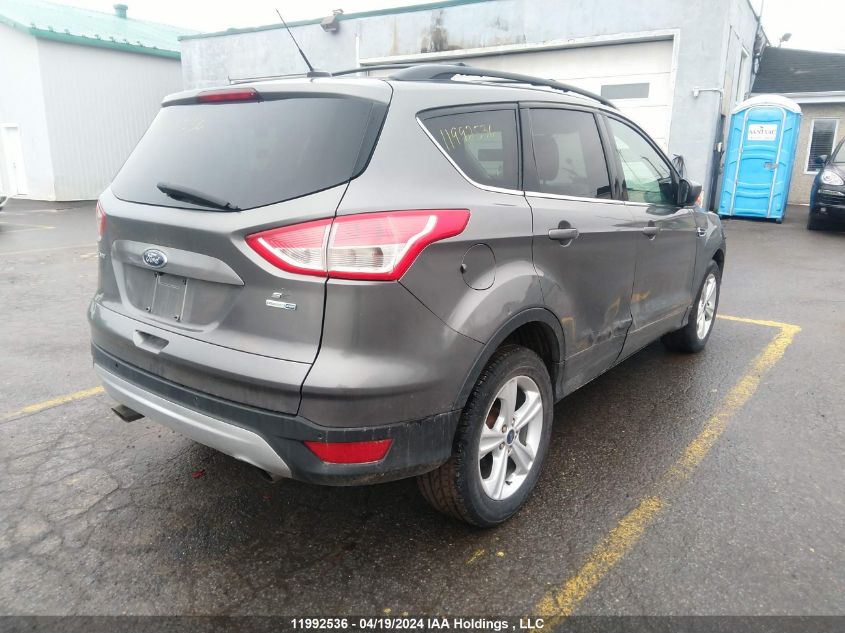 2014 Ford Escape VIN: 1FMCU9GX2EUD11787 Lot: 11992536