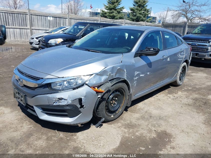 2018 Honda Civic Sedan VIN: 2HGFC2F5XJH018858 Lot: 39240454