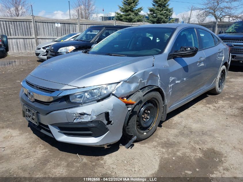 2018 Honda Civic Sedan VIN: 2HGFC2F5XJH018858 Lot: 39240454