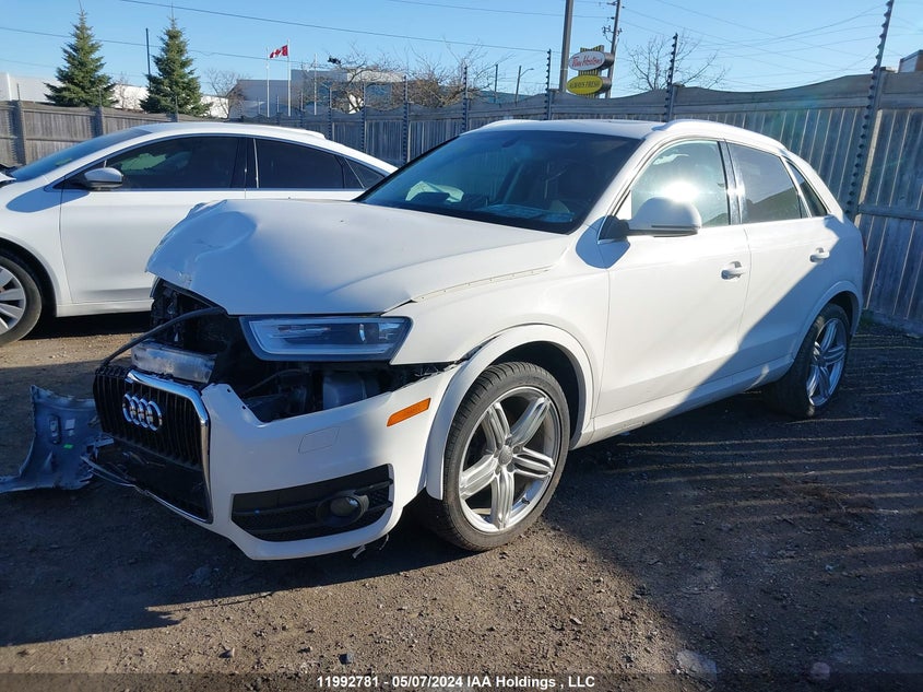 2015 Audi Q3 VIN: WA1FFEFS6FR010738 Lot: 11992781