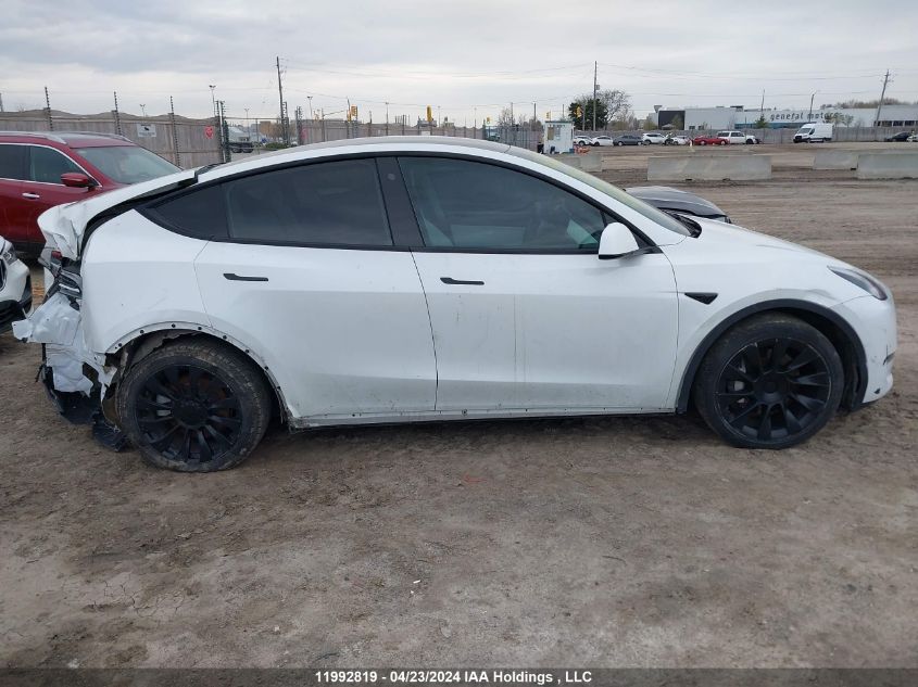 2022 Tesla Model Y VIN: 7SAYGAEE1NF339631 Lot: 11992819