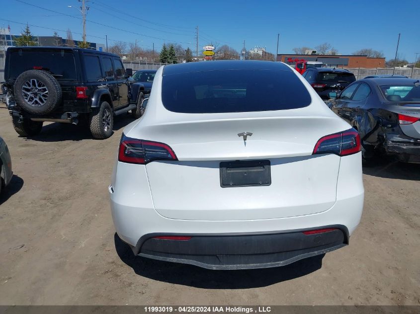 2023 Tesla Model Y VIN: LRWYGDFD8PC967770 Lot: 11993019