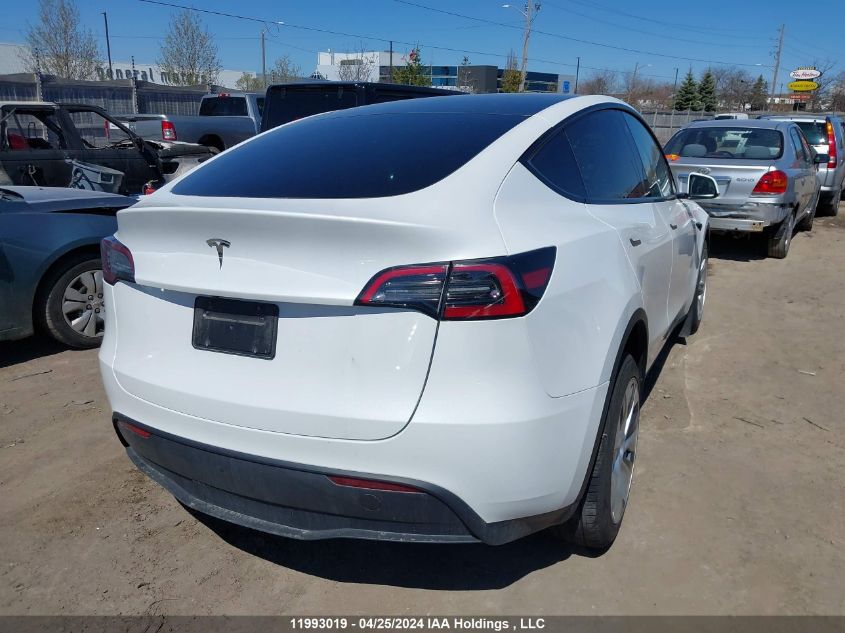 2023 Tesla Model Y VIN: LRWYGDFD8PC967770 Lot: 11993019