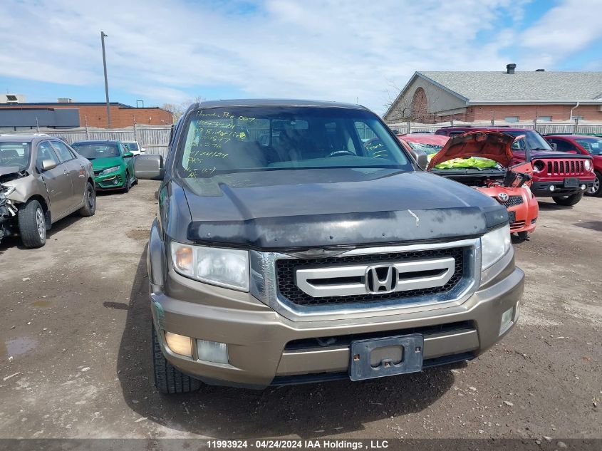 2009 Honda Ridgeline VIN: 2HJYK16579H001897 Lot: 11993924